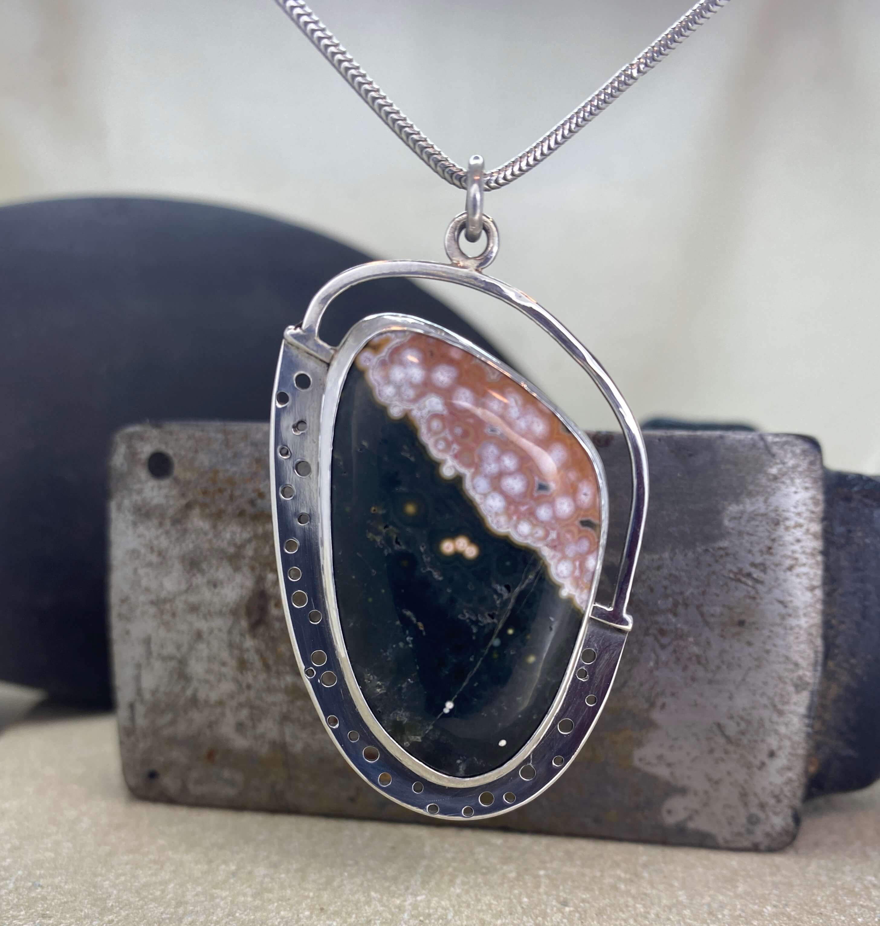 Ocean Jasper pendant in sterling silver - front view hanging