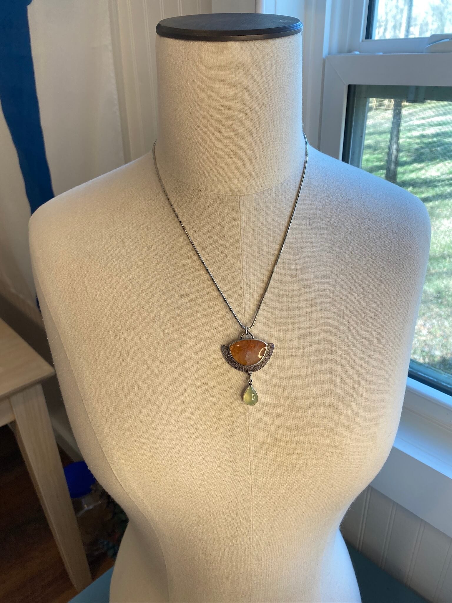 strawberry agate prehnite set in sterling silver - draped view