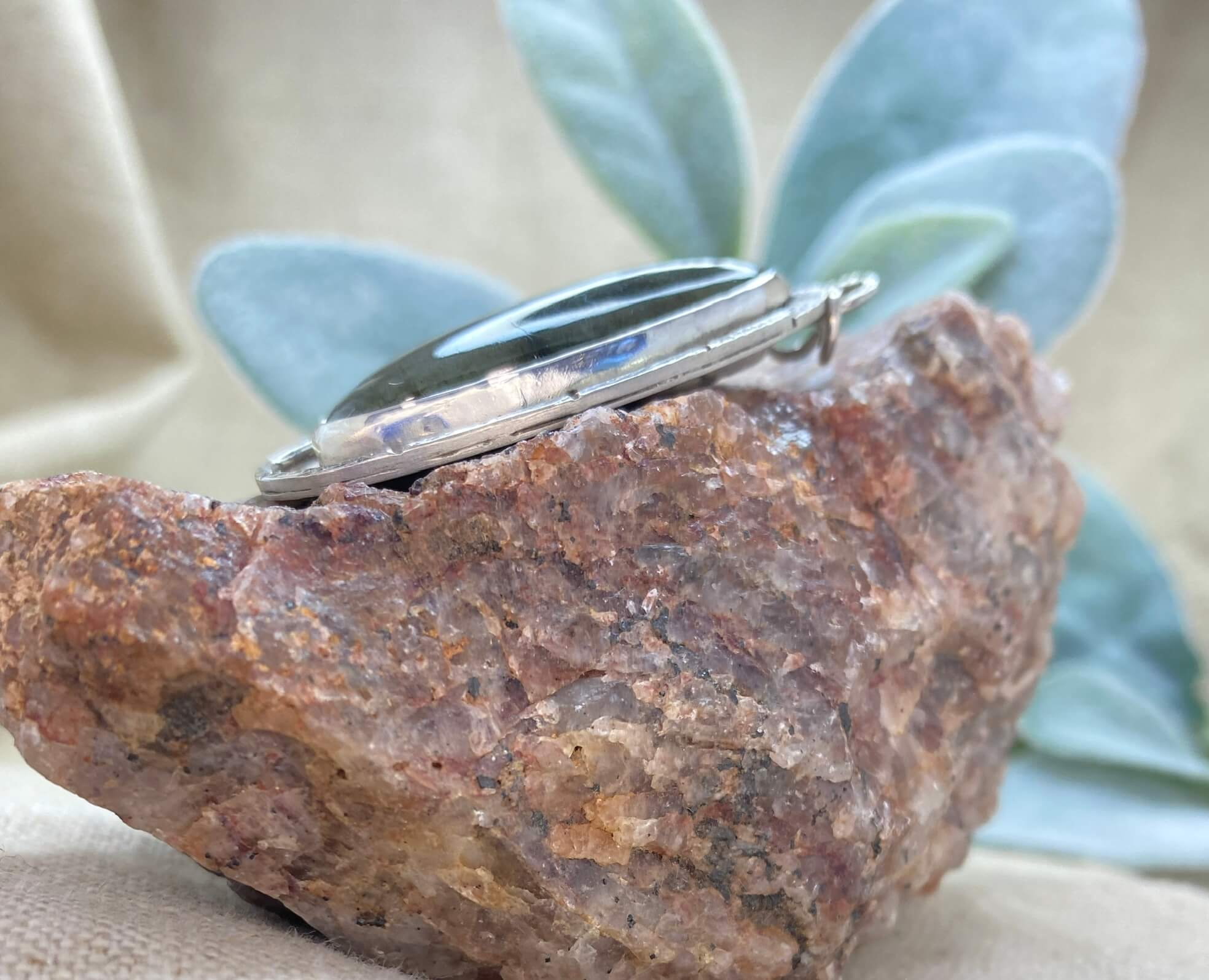 Labradorite with reticulated silver accents - left profile view