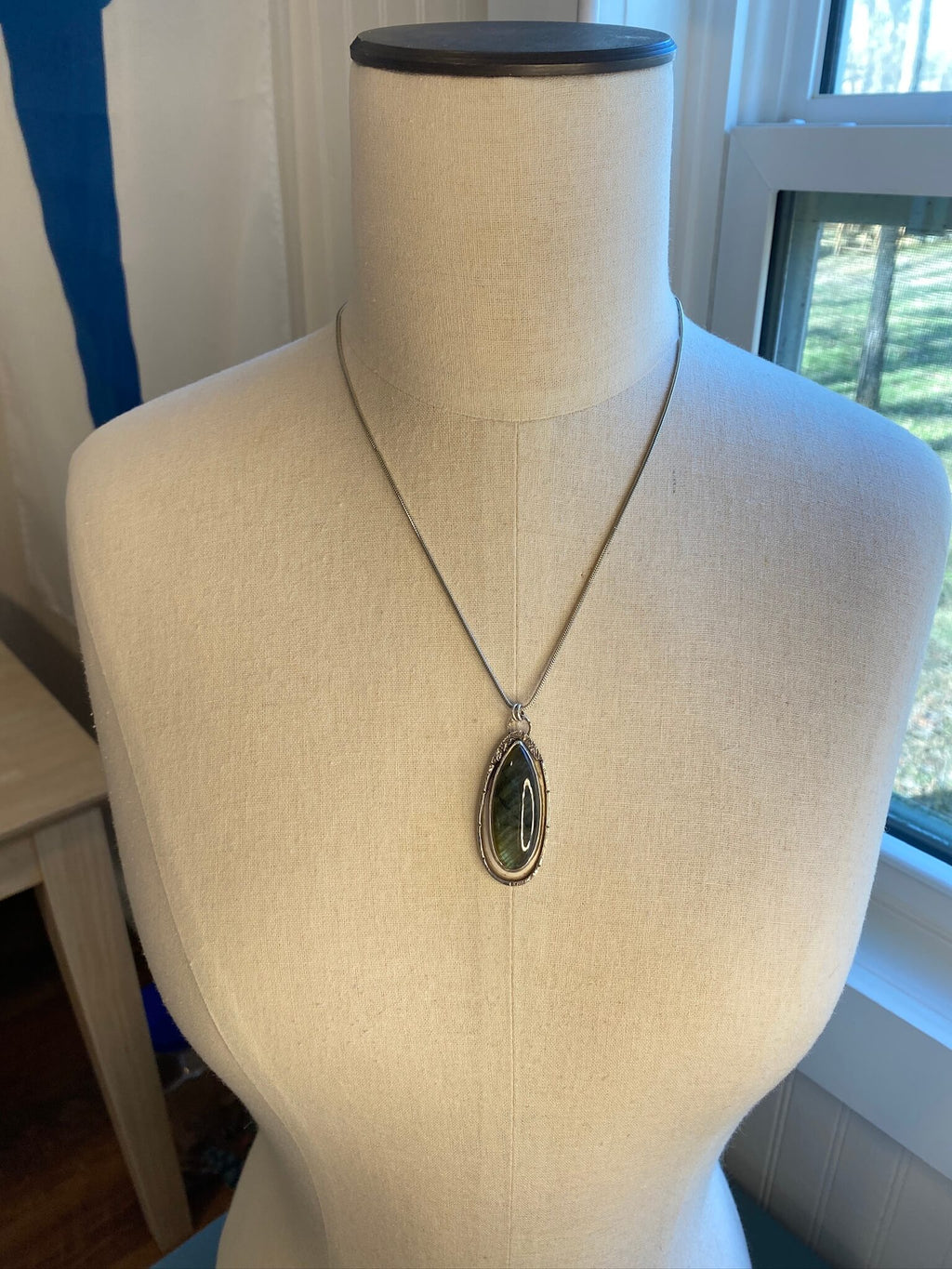Labradorite with reticulated silver accents - draped view