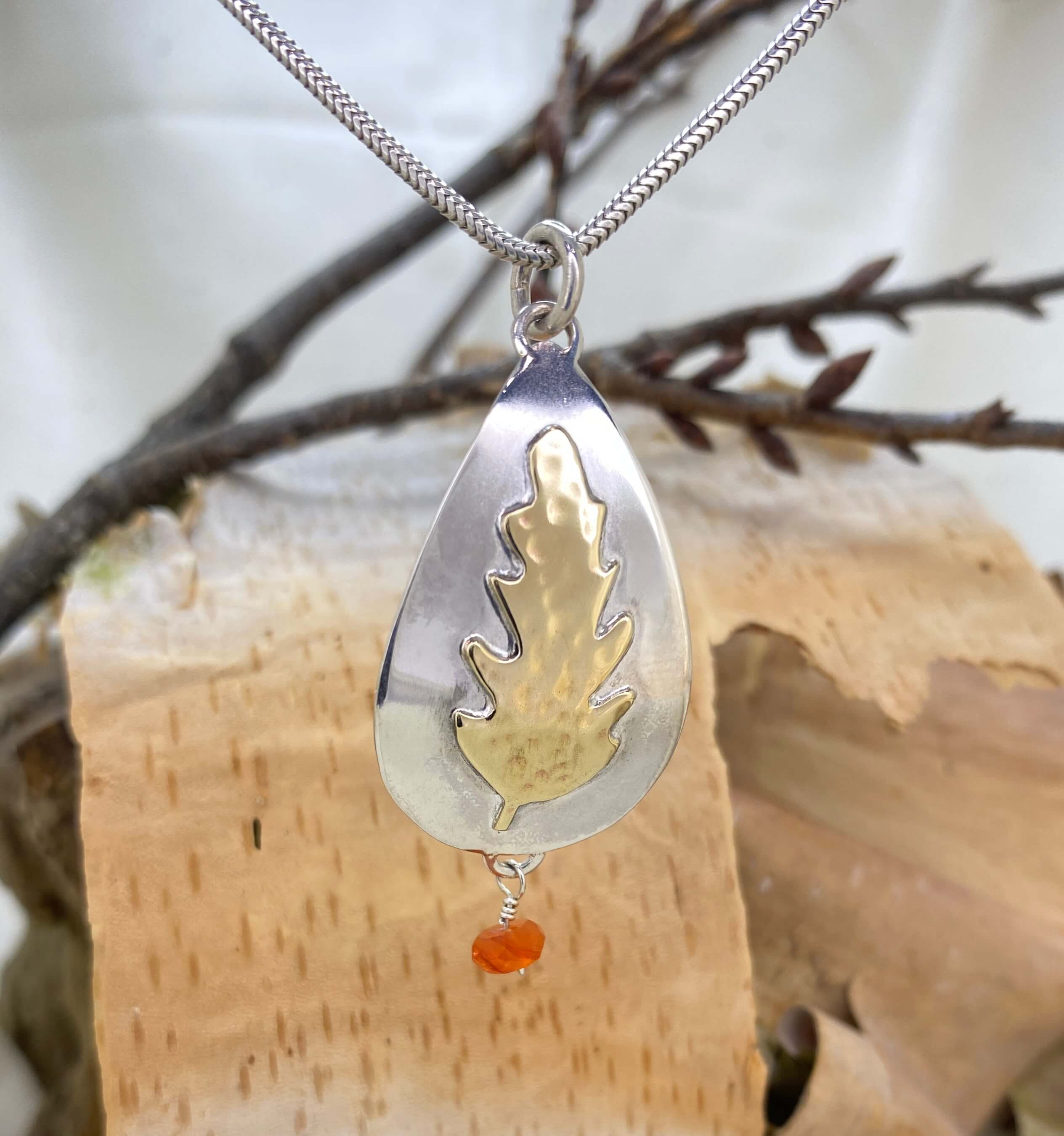 Dancing Flame and Leaf Charm front view