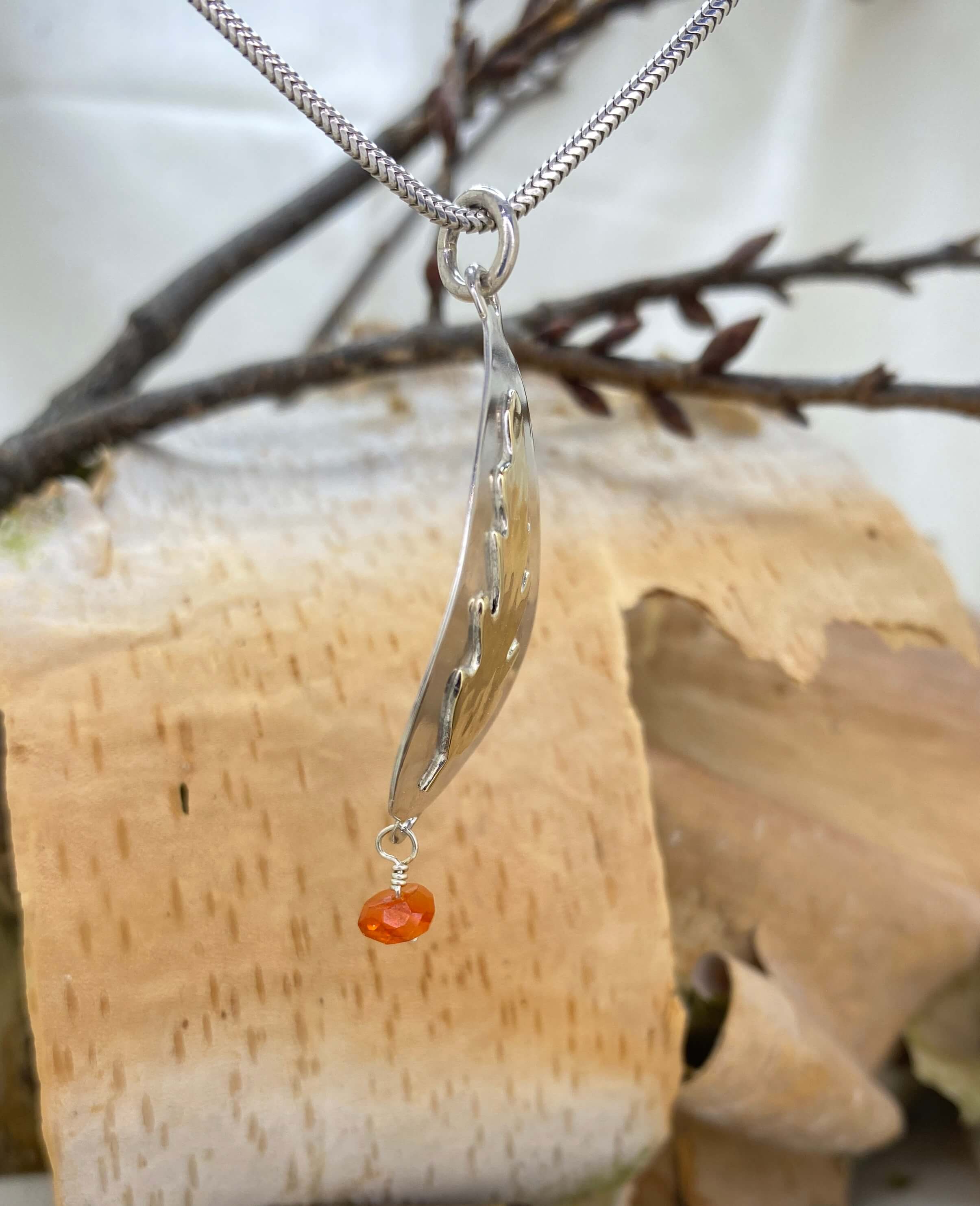 Dancing Flame and Leaf Charm side view