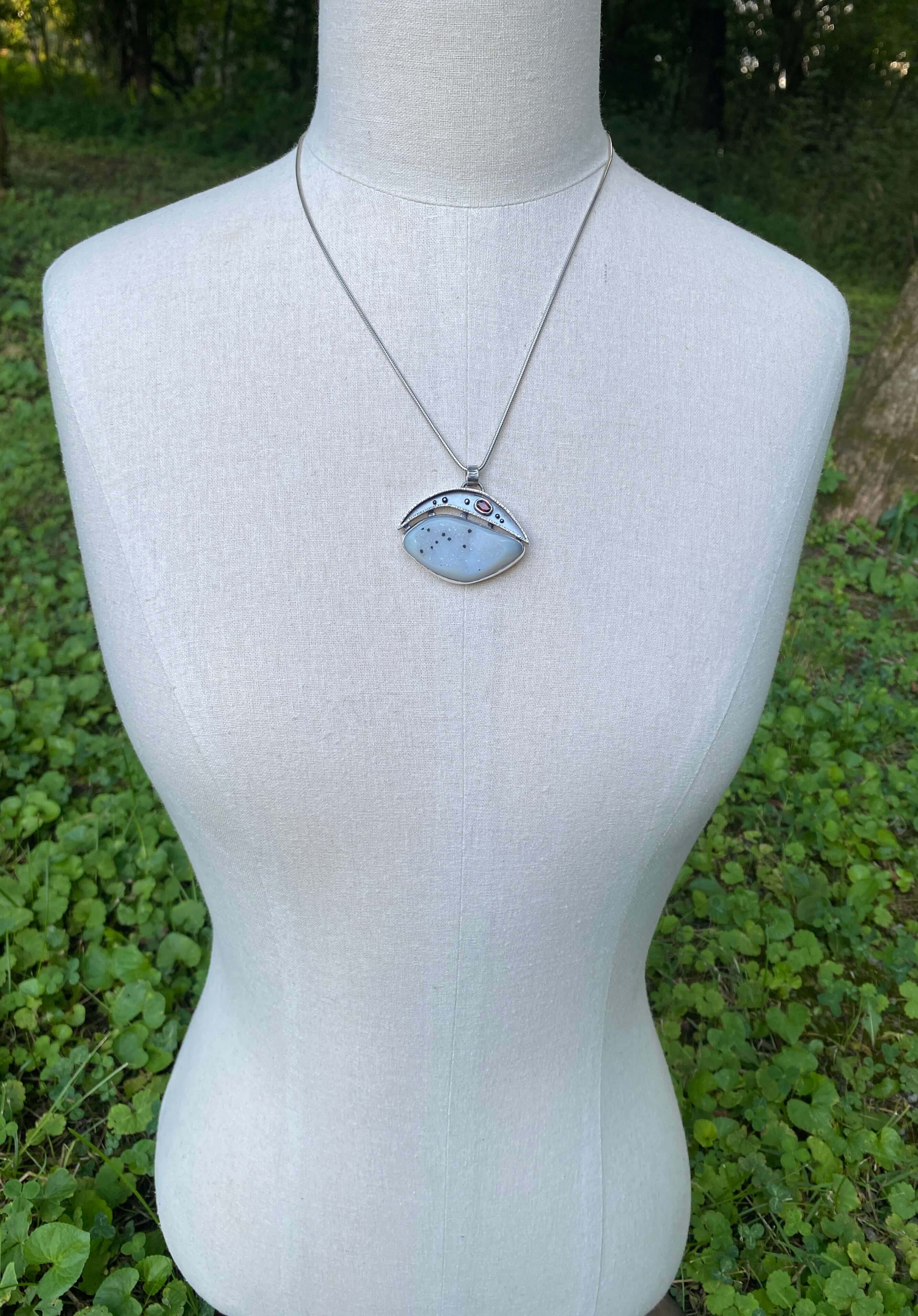 White druzy quartz with black spots and garnet_on dress form