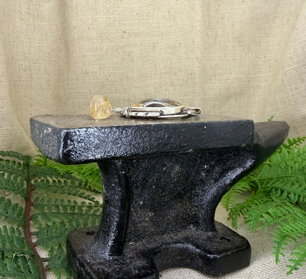 Oval Shaped Plume Agate Pendant in Silver_Side View